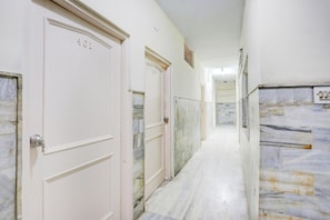 A corridor with doors numbered 401 and 402, leading to rooms.