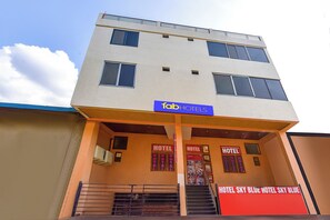 A two-story building with a sign for 'fabHOTELS' above the entrance. - FabHotel Sky Blue (Jaipur)