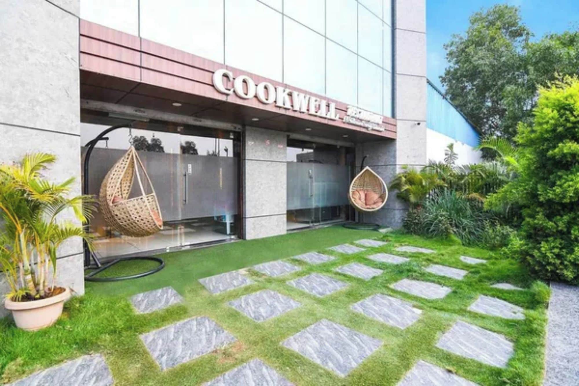 A modern building with a sign reading 'COOKWELL.'