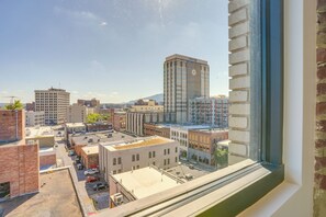 A cityscape with various buildings, including a prominent hotel with a clock tower. - 7th-Floor Condo: Walk to Cafes, Dining & More (Chattanooga)