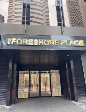 The entrance to a building with a sign reading 'FORESHORE PLACE'. - Cozy 1-bedroom apartment in phenomenal Cape Town with AC (Cape Town)