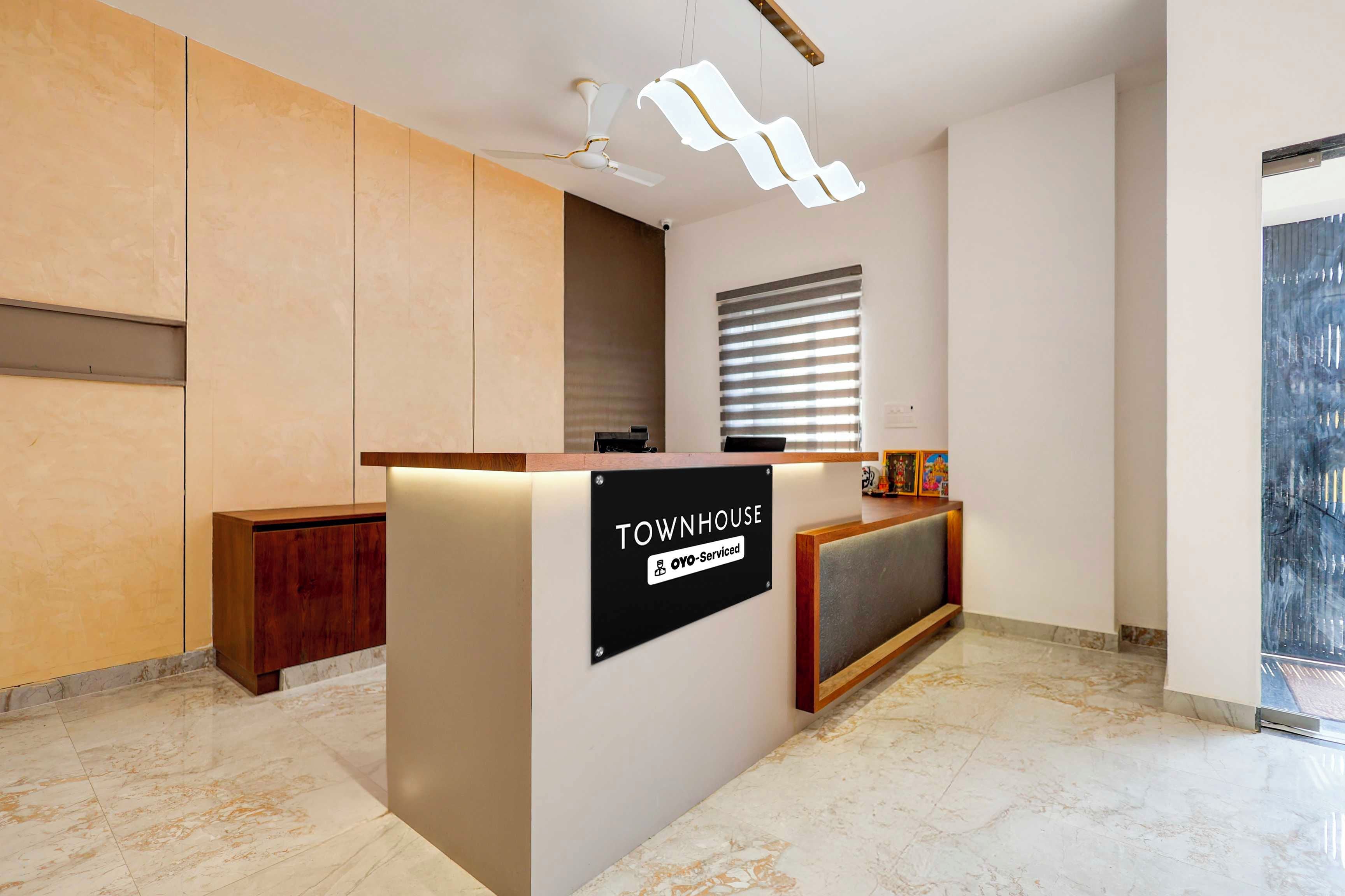 A reception desk with a sign indicating it is serviced by YOYO.