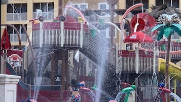 A water park with multiple water features and slides.
