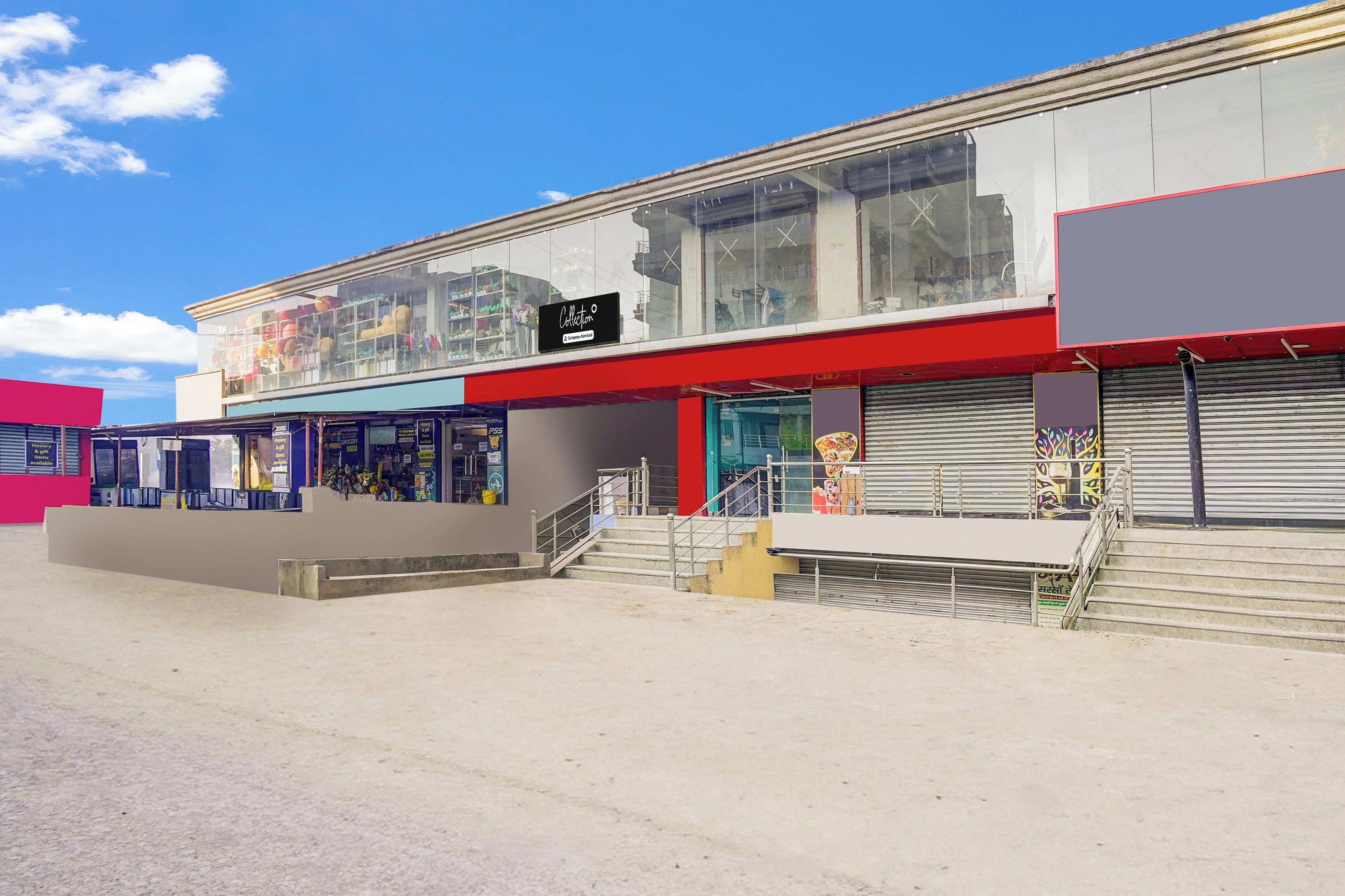 A multi-story building with a storefront on the ground floor.
