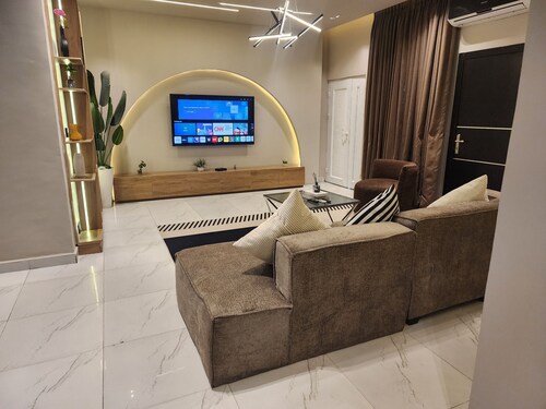L Rina Apartment Brown unit