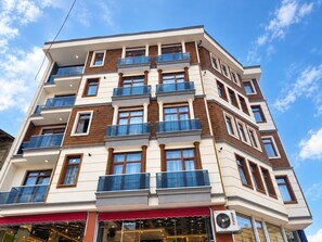 Front of property - OKYNS SUIT (Van Merkez)