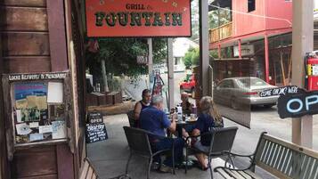 A restaurant named 'Lockeport Grill & Fountain' with outdoor seating.