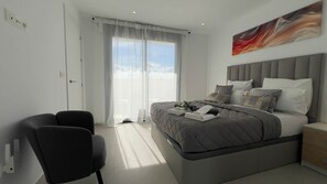 Une chambre à coucher moderne avec un lit, une chaise, une table de chevet et un tableau accroché au mur.