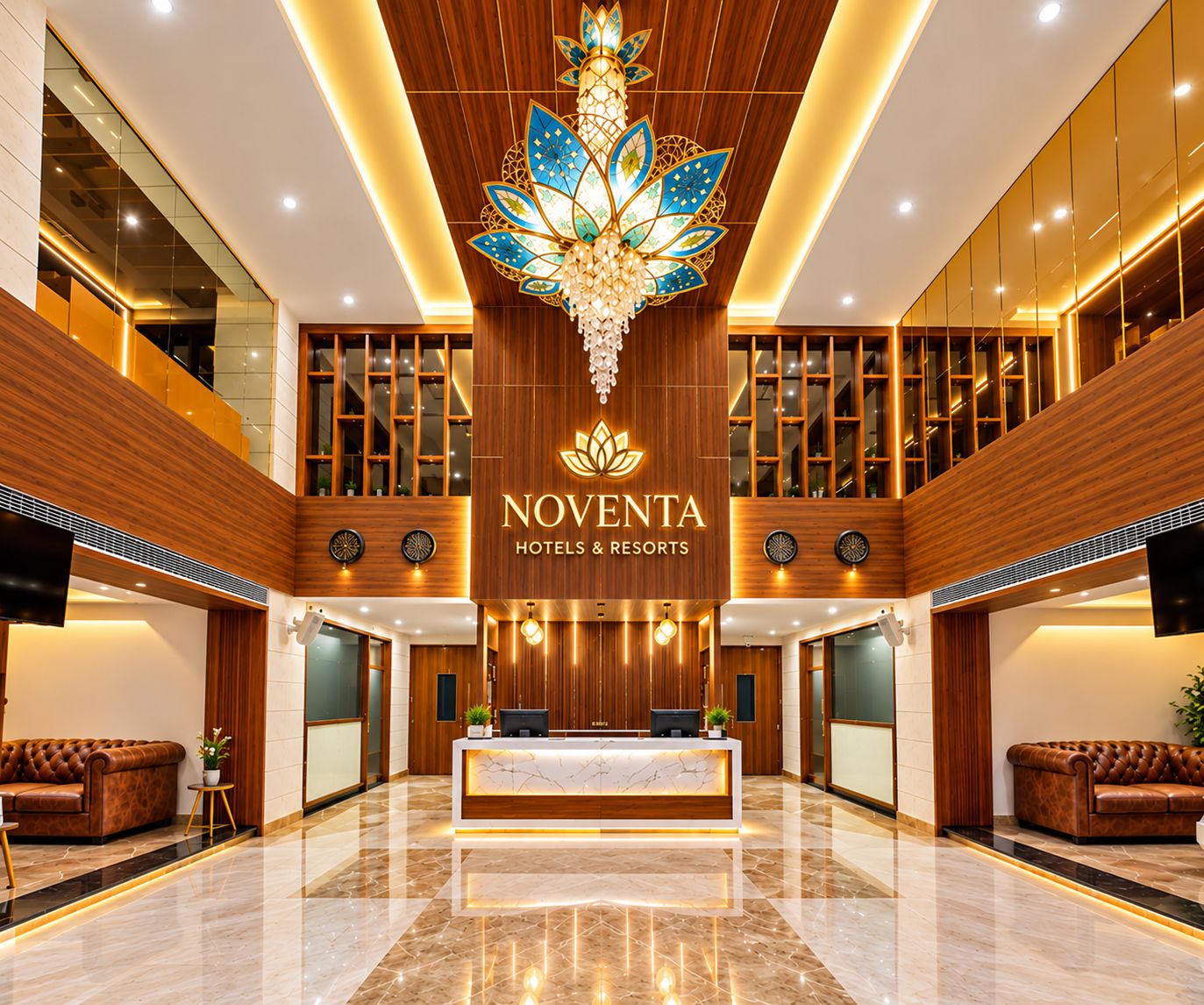 A hotel lobby with a reception desk, plush seating, and a decorative chandelier.