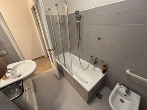 A bathroom with a glass-enclosed shower, a bathtub, a sink, and a bidet. - New Listing (Verona)