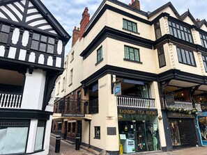 A corner building with a tea room, a commercial passage, and a shop named Chester Weavers. - Gorgeous 2BR Apartment in Central Chester (Cheshire West and Chester)