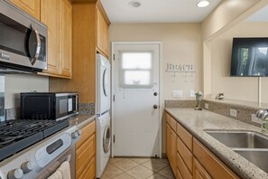 Washer/Dryer in kitchen - Anchors Away - Pacific Grove Condo - Your Oceanfront Beach Pad (Pacific Grove)