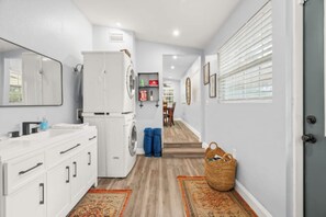 Laundry room; also access to the pool and backyard