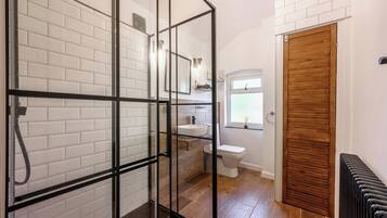 Newly renovated upstairs shower room with a large walk-in rainfall shower. With a second bathroom downstairs, there are no morning queues, even with six guests in the house.