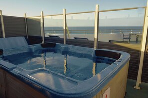 A hot tub on an outdoor deck with a view of the sea. - Golden Era - Tugun Beachfront (Tugun)
