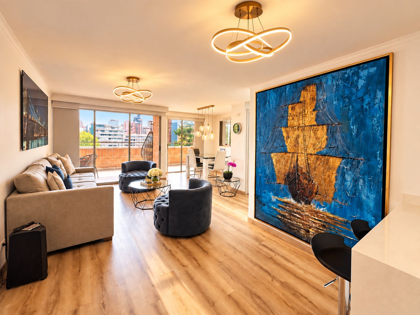 A spacious living room with a large abstract painting, a sofa, a coffee table, and a dining area with chairs.