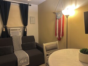Living area - Playa Sol Beachfront: King Bed Facing The Ocean with Central A/C (Luquillo)
