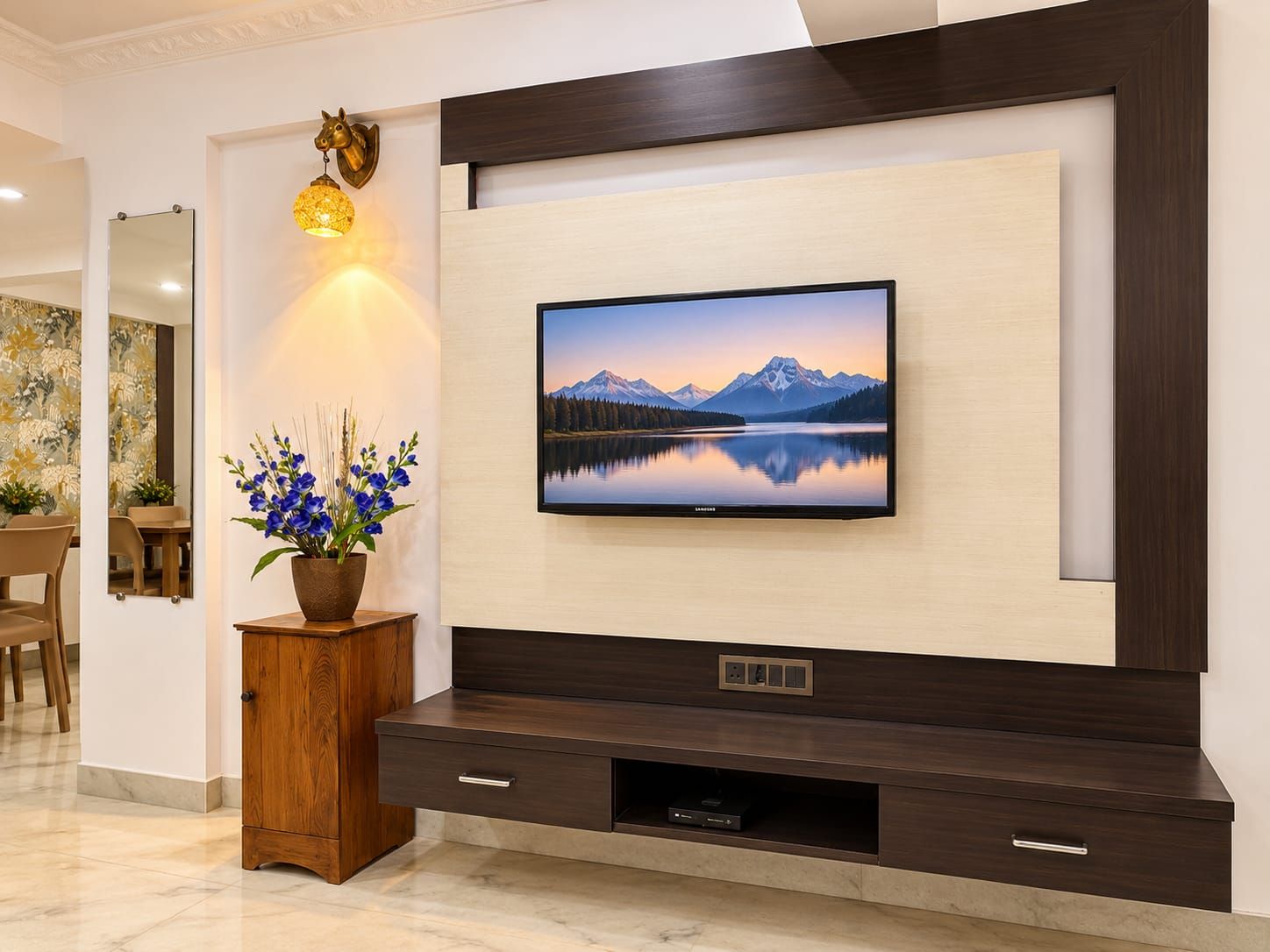 A modern living room with a flat-screen TV mounted on a wooden wall, a small wooden cabinet below, and a vase of flowers on a side table.