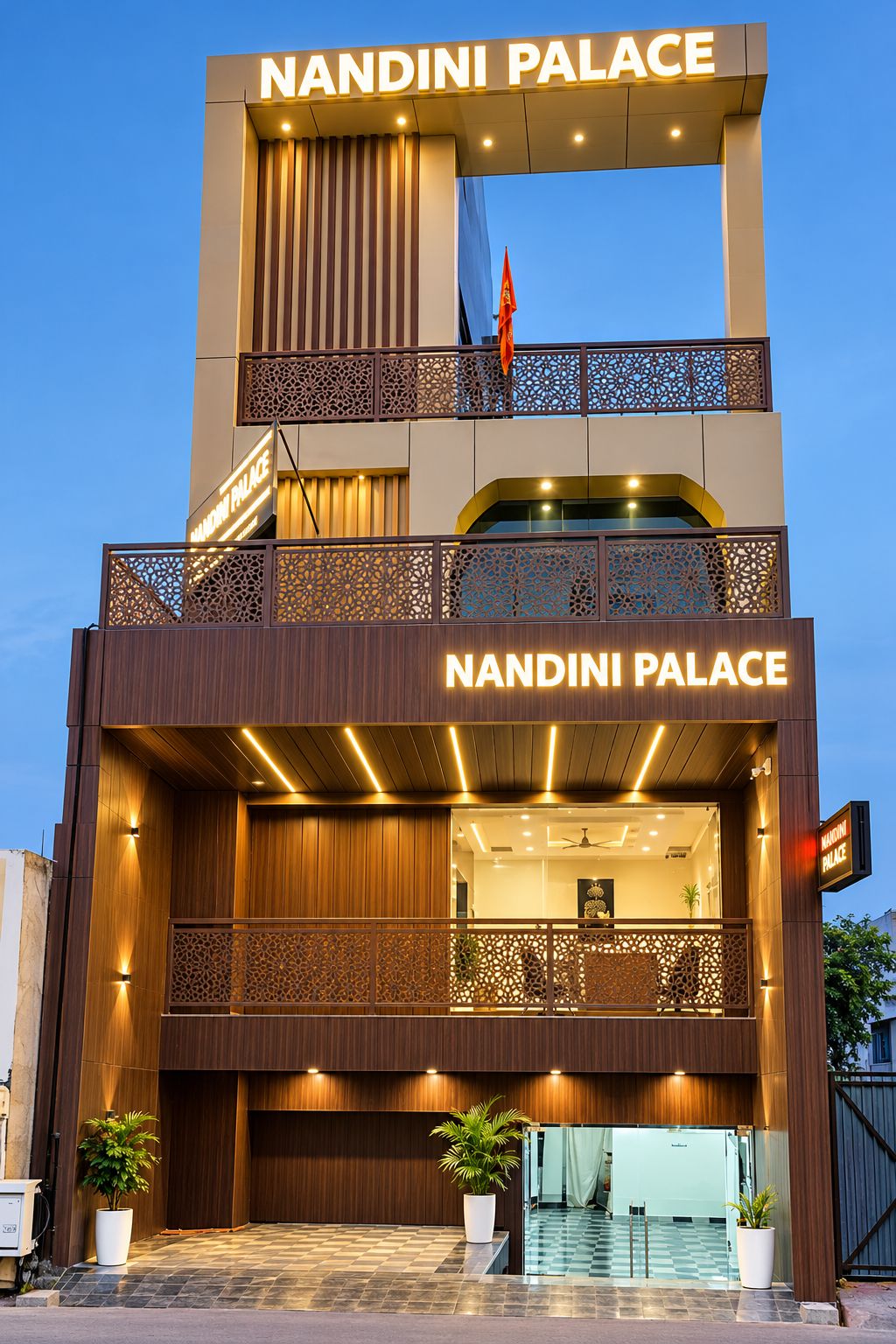 A two-story building with the sign 'NANDINI PALACE' prominently displayed.