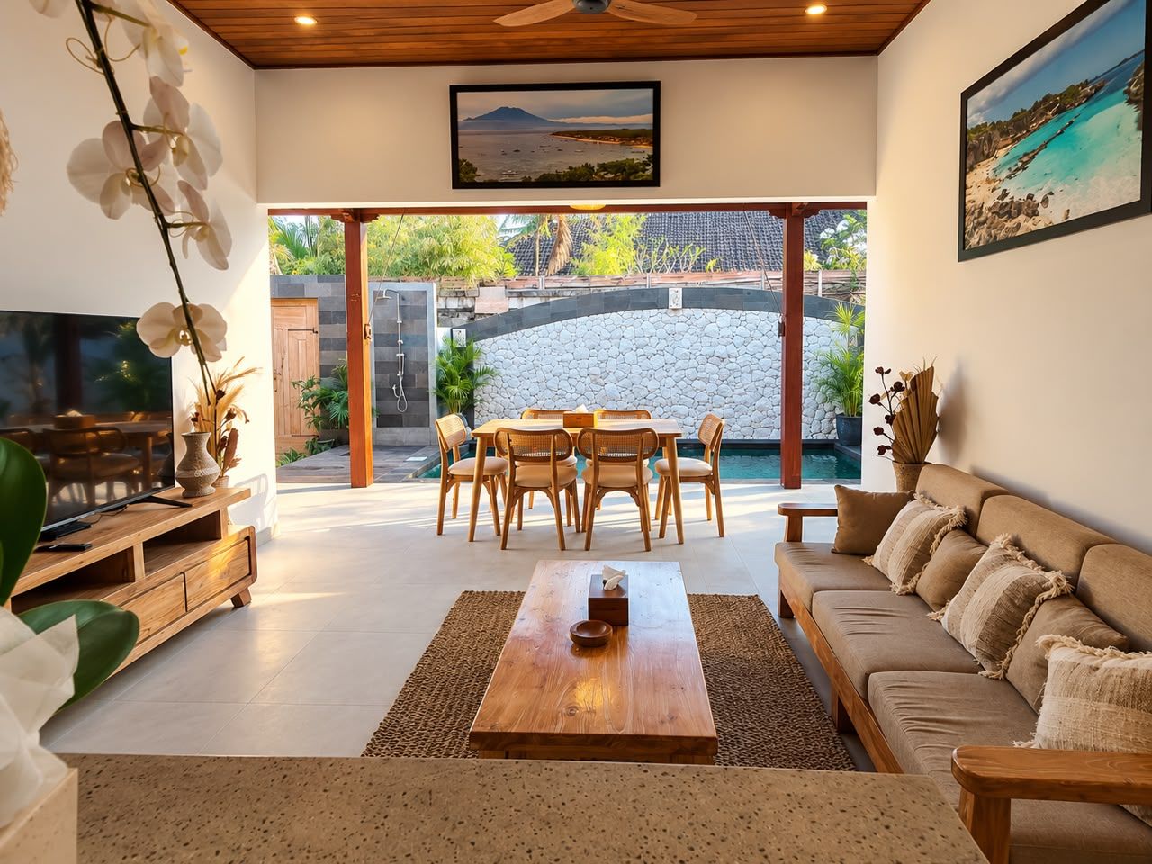 A modern living room with a wooden coffee table, sofa, and dining set.
