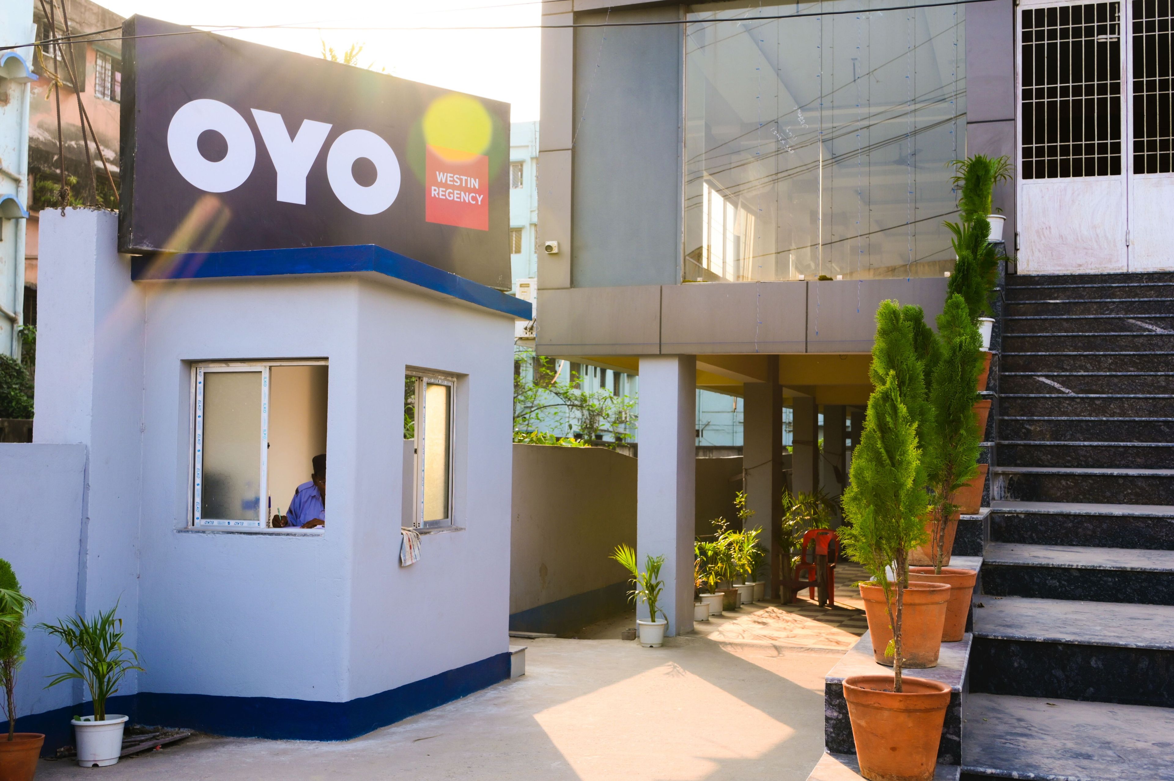 A building with a sign that reads 'OYO WESTIN REGENCY'.