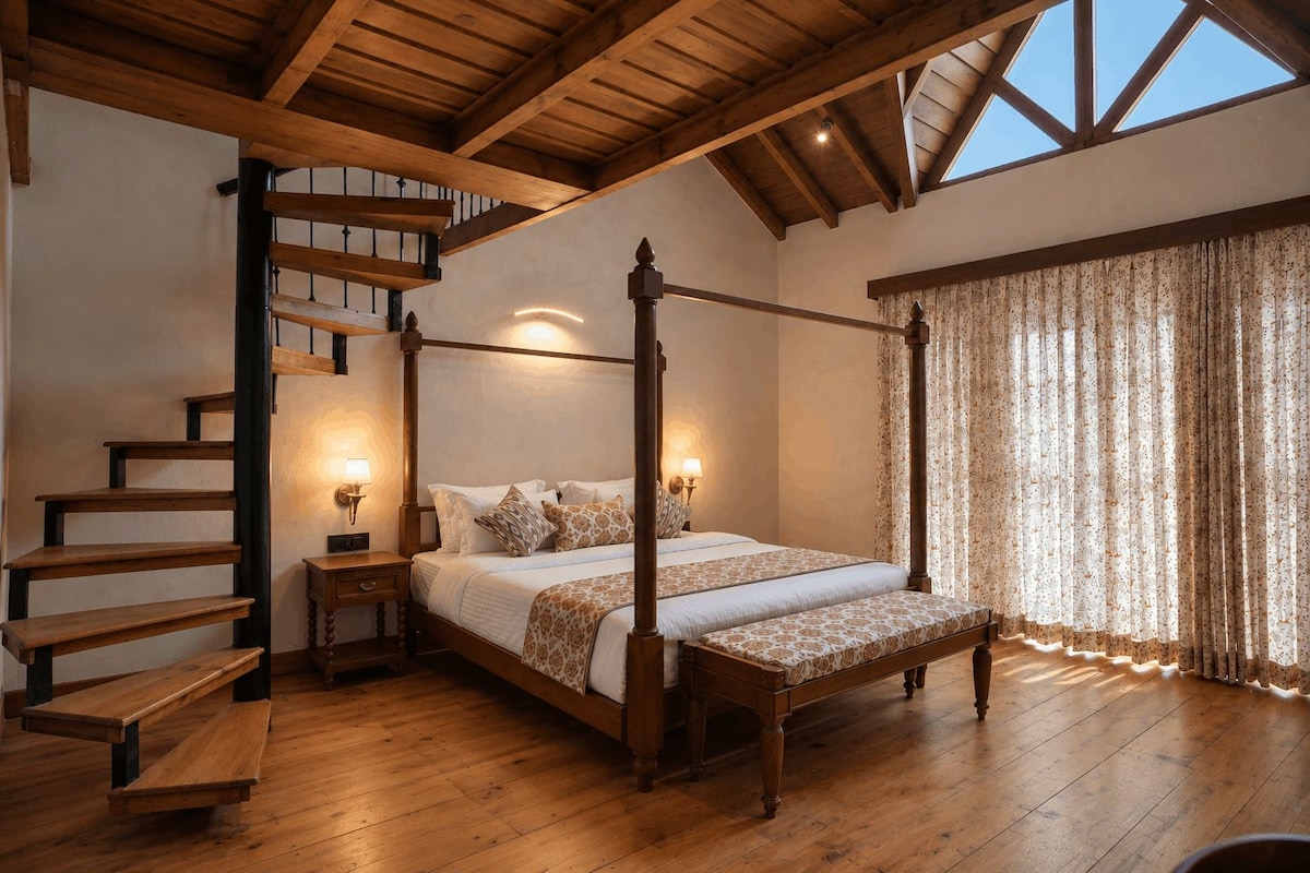 A four-poster bed with a wooden staircase and a view of the sky.
