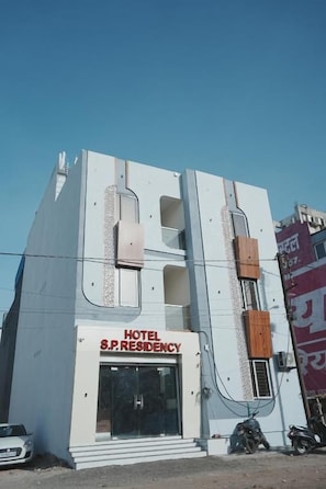A hotel with a sign reading 'HOTEL S.P. RESIDENCY' and a visible entrance. - Hotel SP Residency (Indore)