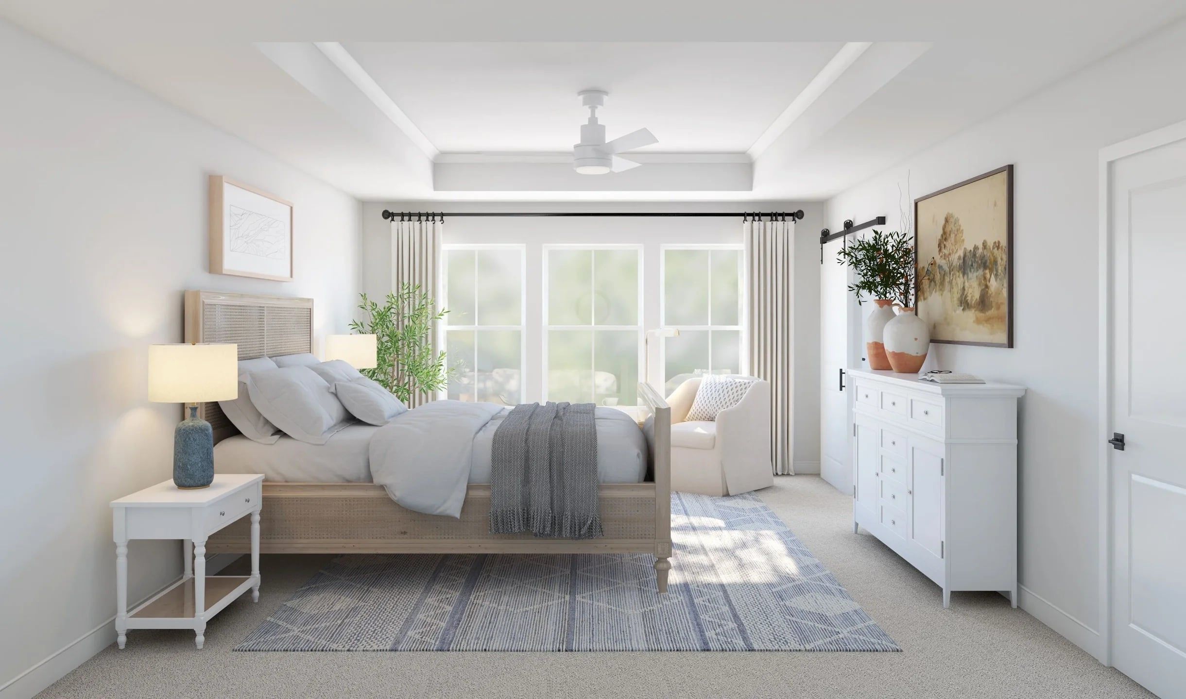 A bedroom with a bed, bedside tables, a nightstand, a dresser, a ceiling fan, and a window with curtains.