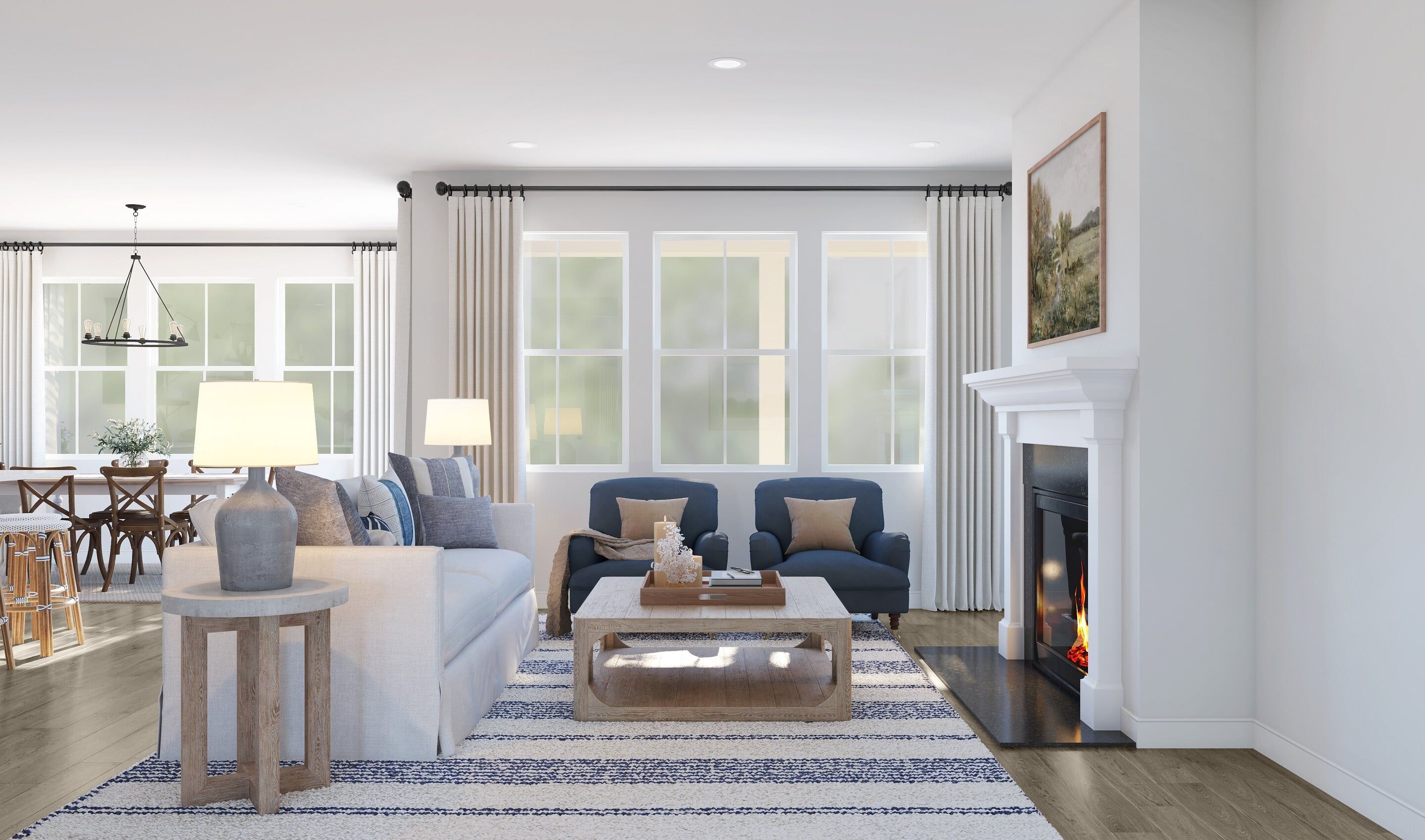 A living room with a fireplace, a sofa set, a coffee table, and a dining area with chairs and a lamp.