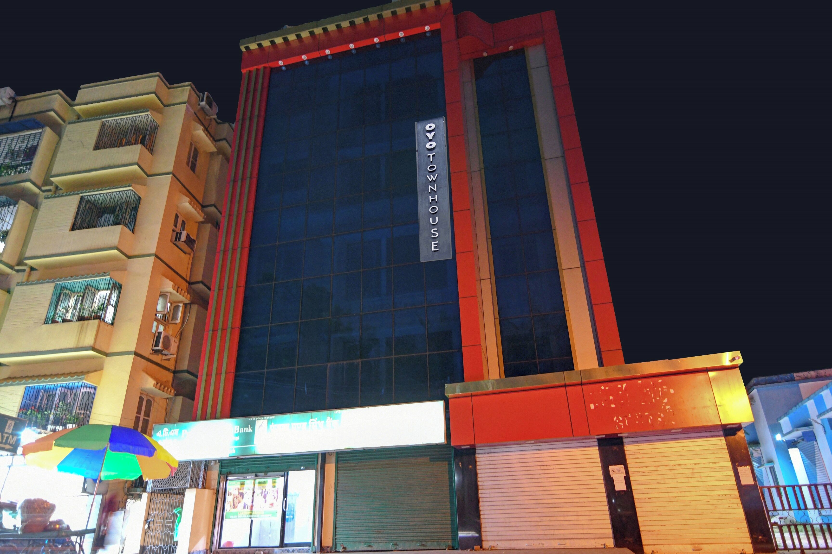 A multi-story building with a prominent sign reading 'HOTEL'.