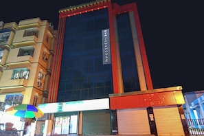 A multi-story building with a prominent sign reading 'HOTEL'. - Hotel O THE CROWN COMFORTS (Bidhannagar)