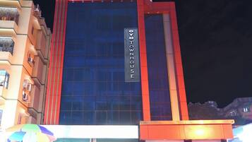A multi-story building with a prominent sign reading 'YOYOTOWNHOUSE'.
