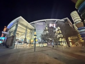 A modern building with a large glass facade and signage reading 'Spectrum Center.' - Crown Downtown | Close to Uptown & Local Dining (Charlotte)