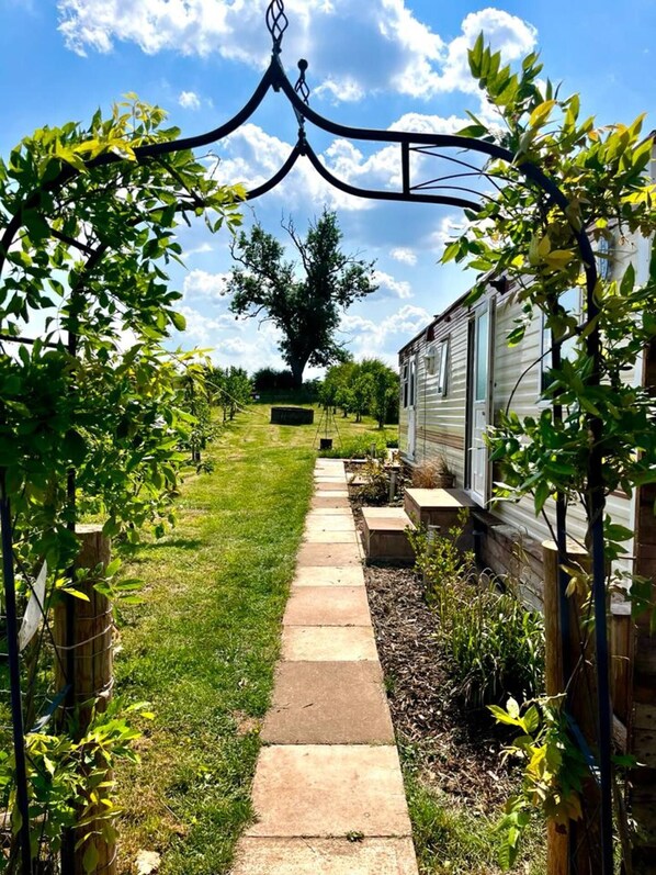 Charming garden walkway with peaceful countryside views