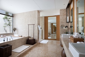 A modern bathroom with a large mirror, two sinks, a bathtub, and a walk-in shower. - Ultra-luxury Villa for Rent in America 0001 (Baltimore)