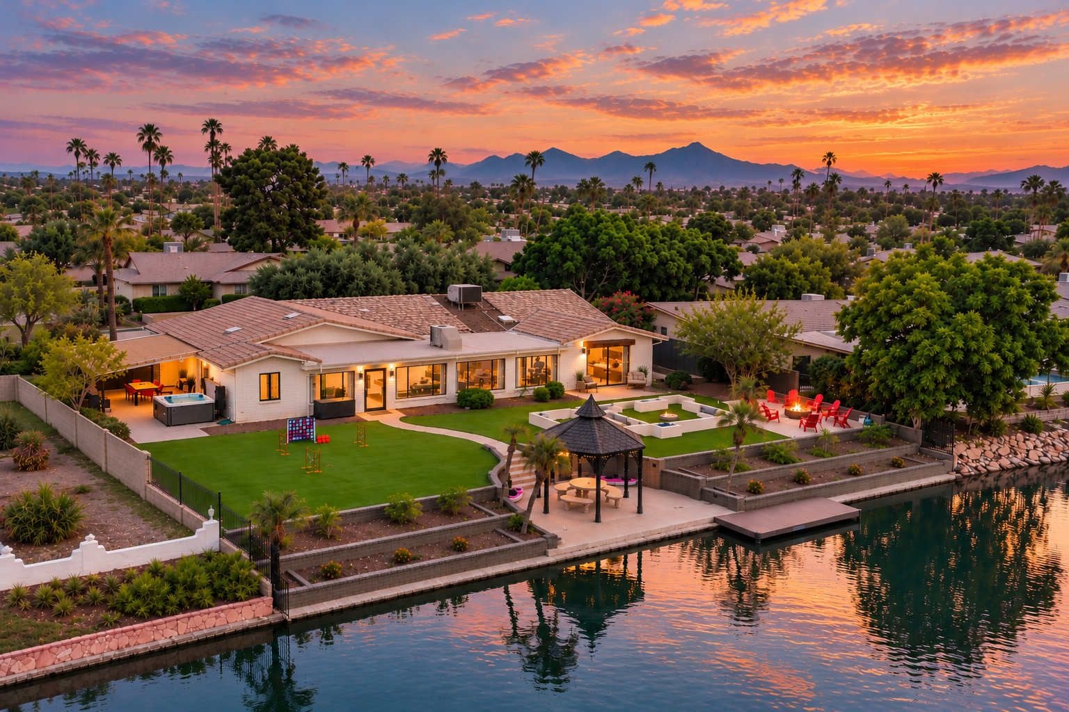 A residential property with a swimming pool, a patio area, and a well-maintained lawn.