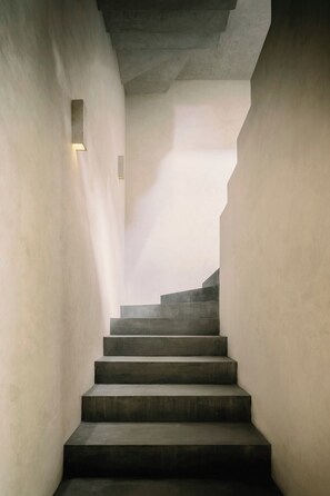 A staircase with a modern design, leading upwards. - Casa Aviv Iconic Minimalist 4BR Design Villa (Tulum)