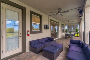 Fully Enclosed Private Patio with dining and lounge seating and no rear neighbors! - New Listing | Choose Your Own Adventure! 4 Themed Rooms, a Private Arcade and a Pool | Sleeps 25! (Kissimmee)