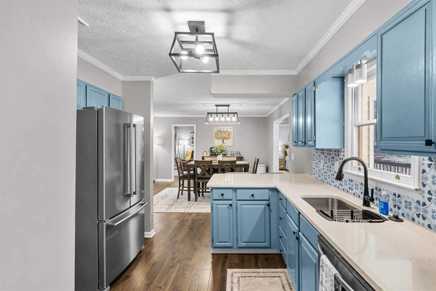 Cook a real dinner at the island. Full-size fridge and range, not a hot plate.