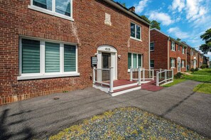 A brick residential building with a front porch, a mailbox, and a number '4535' on the door. - ADA Access - NIH & Walter Reed in Walking Distance (Bethesda)