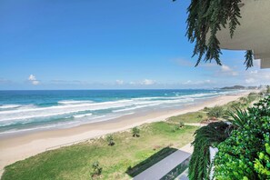 A coastal view with a beach, ocean waves, and a clear sky. - The Esplanade, Palm Beach (Palm Beach)