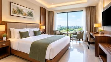 A hotel room with a large bed, a desk, a chair, a TV, and a view of the city.