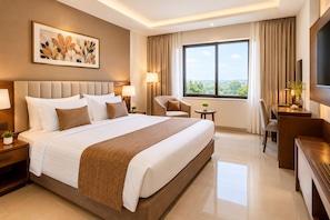 A hotel room with a large bed, a desk, a chair, a TV, and a window with a city view. - Hotel TwentyFour Grandeur (Perundurai)