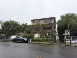 A two-story building with a brick facade and large windows. - Cremorne Point Harbour Escape (Cremorne Point)