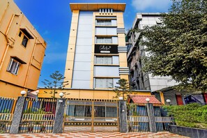 A multi-story building with a prominent sign reading 'Collection'. - Super Collection O SF Road Siliguri (Siliguri)
