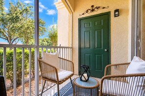Outdoor patio - New Listing in Legacy Dunes! Updated 2 Bdrm,1 bath Condo | Minutes to Disney, Gated Community w Pool (Kissimmee)