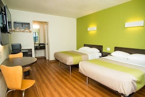 A hotel room with two beds, a desk, a chair, and a television. - Elegant 2 Queen Bed|Parking|Pool (PALESTINE)
