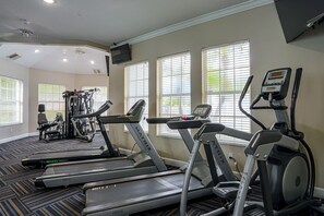 A gym with treadmills, elliptical machines, and weight equipment. - Resort Perks! Family Condo 4 Mi to Disney World! (Kissimmee)