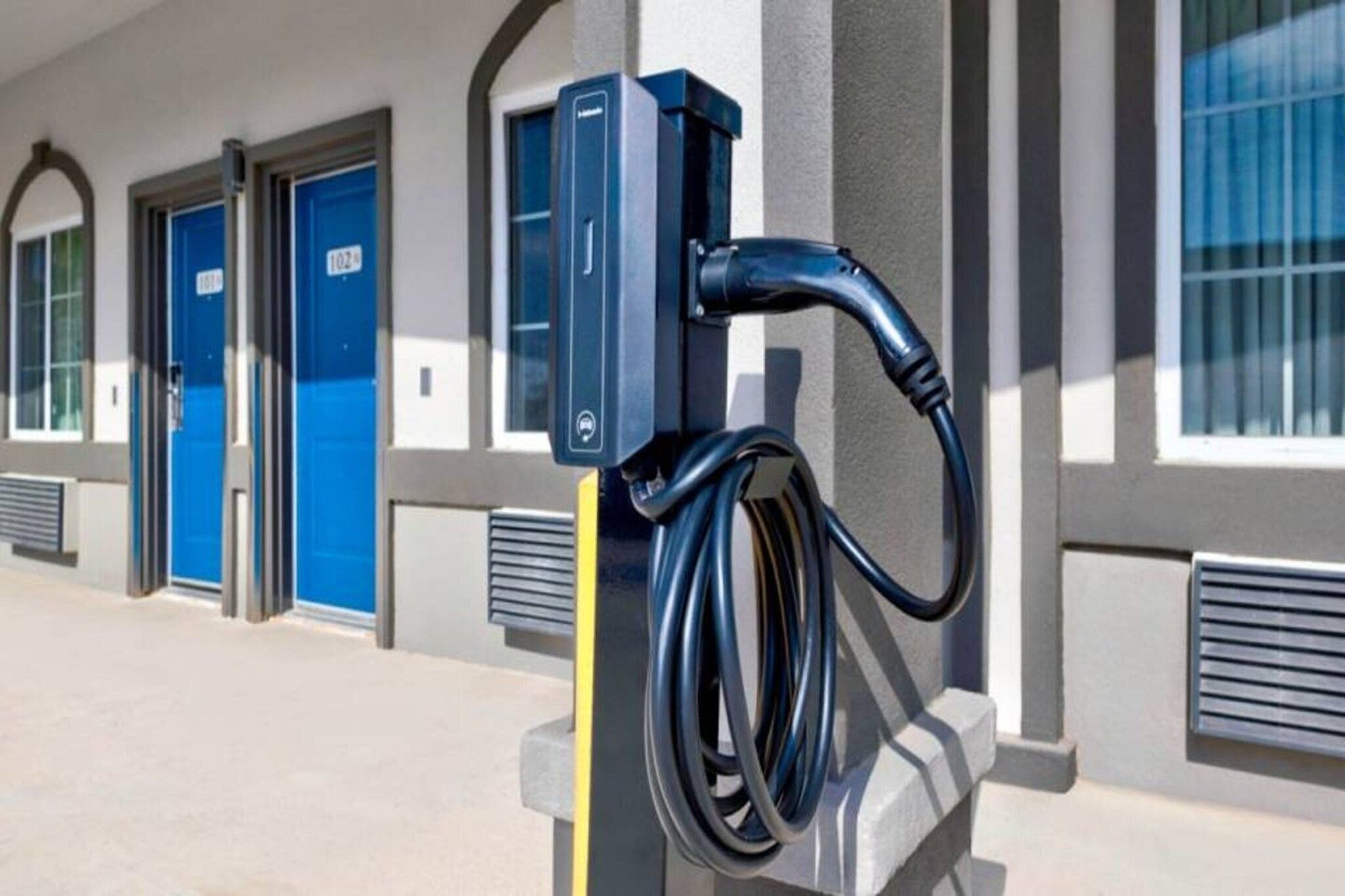 A parking area with electric vehicle charging stations.