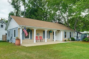 A two-story house with a porch, a flag, and a mailbox. - 1 Mi to Colonial Beach! Coastal Escape w/ Fire Pit (Colonial Beach)
